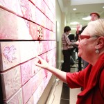 Admiring the One-Heart mosaic - photo by Meredith Jones.